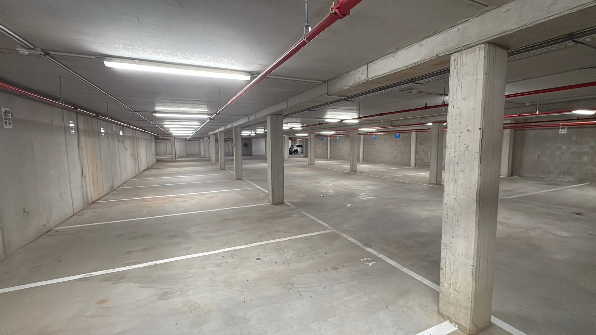 Parking zone — overhead view, clean infrastructure