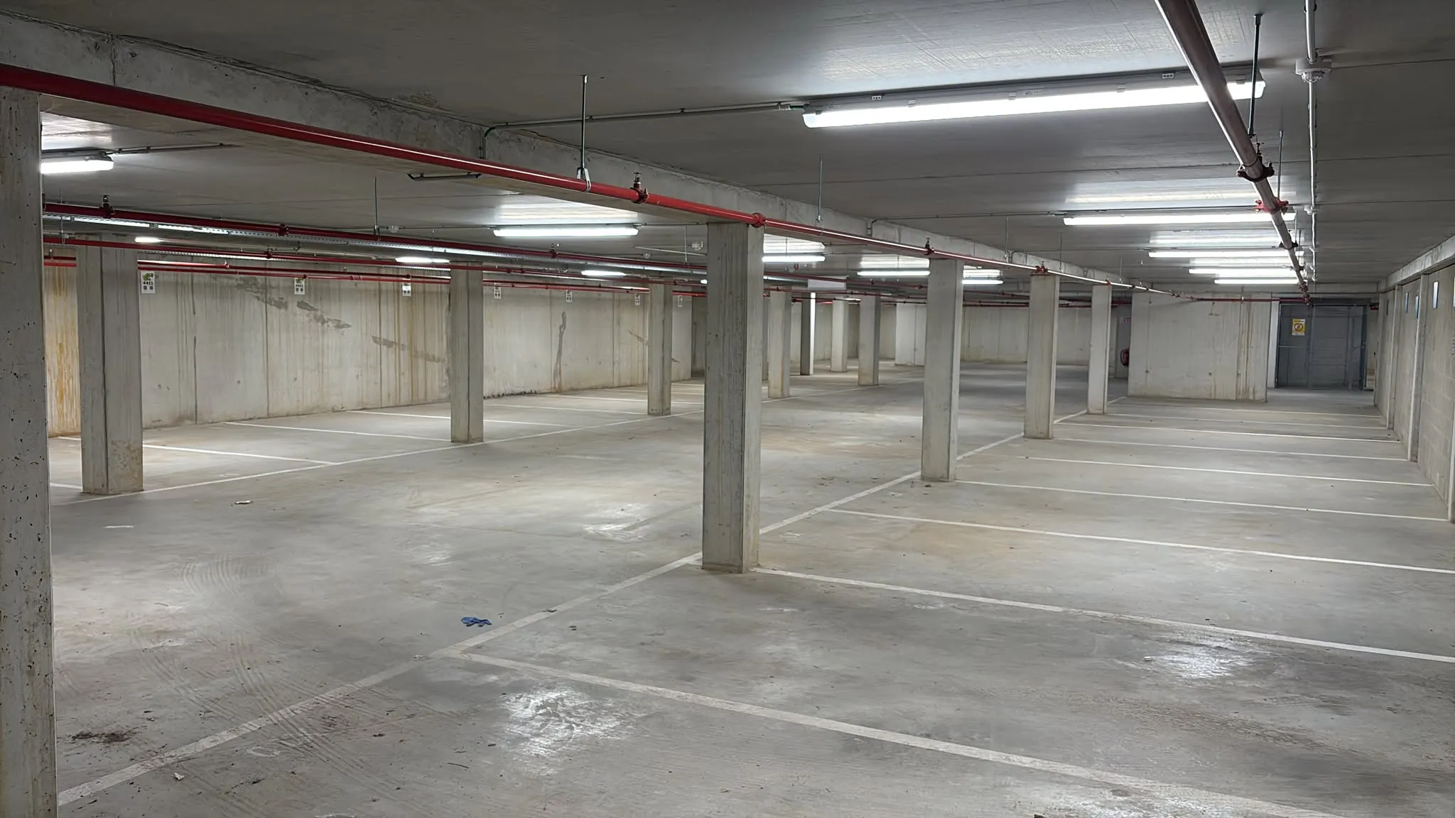 Covered car parking — dedicated spaces with clear markings