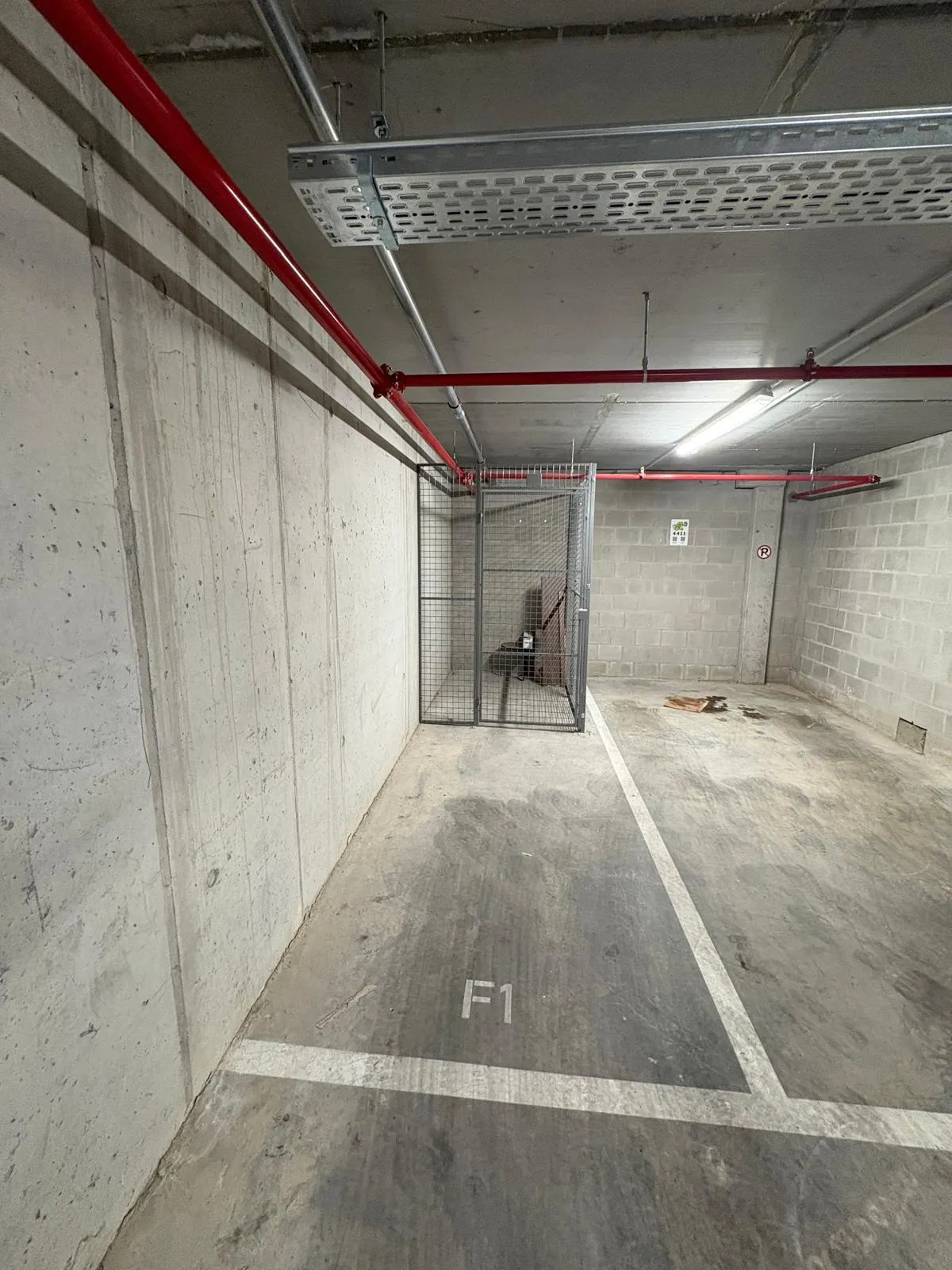 Motorcycle and electric vehicle parking space — covered facility, LED lighting, fire suppression