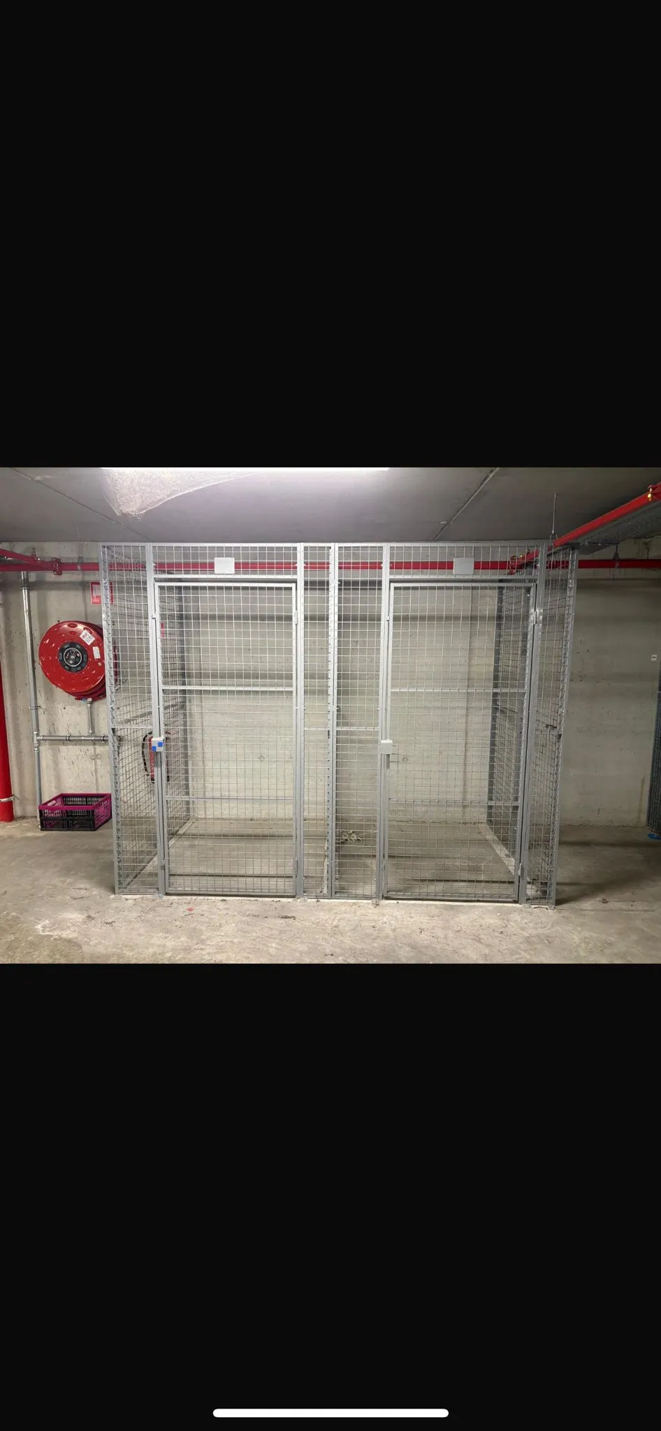 Storage cage units 2×2 m in parking garage — wire mesh, fire suppression
